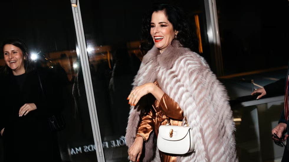 Parker Posey Shines at Printemps NYC Launch with Iconic Gucci Bag