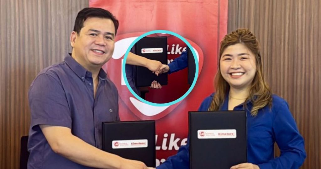 Two individuals shaking hands at a signing event, holding documents with logos of LBC and Kimstore in the background.