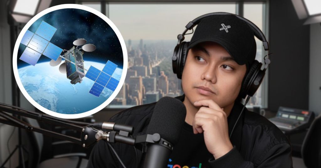 A thoughtful person wearing a black cap and headphones sits in a modern studio, with a microphone in front of them, and a city skyline visible through a window. In the foreground, there's an illustration of a satellite with solar panels orbiting the Earth.
