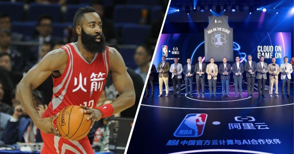 A basketball player in a red uniform holding a basketball on the left, alongside a group of people in suits at a stage event on the right, prominently featuring an NBA logo and a large jersey hanging in the background.