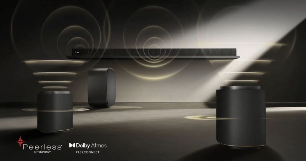 A modern sound system featuring a sleek soundbar with Dolby Atmos technology paired with two cylindrical speakers, showcasing sound waves emanating from the devices in a dimly lit setting.