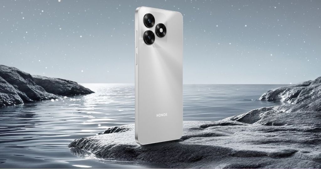 A silver smartphone on a rock by the water, with a serene background and a starry sky.