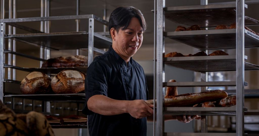 Who is behind the signature daily-baked breads now available at Solaire Resort Quezon City