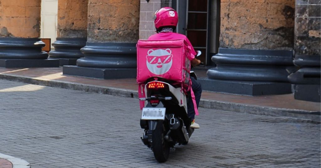 foodpanda rider in a motorcycle
